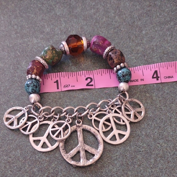Multicolored Beaded Bracelet with Silver Peace Charms - Picture 6 of 6